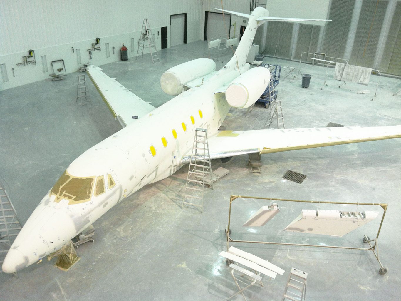 A large Prep Environments sitting inside of a hangar.